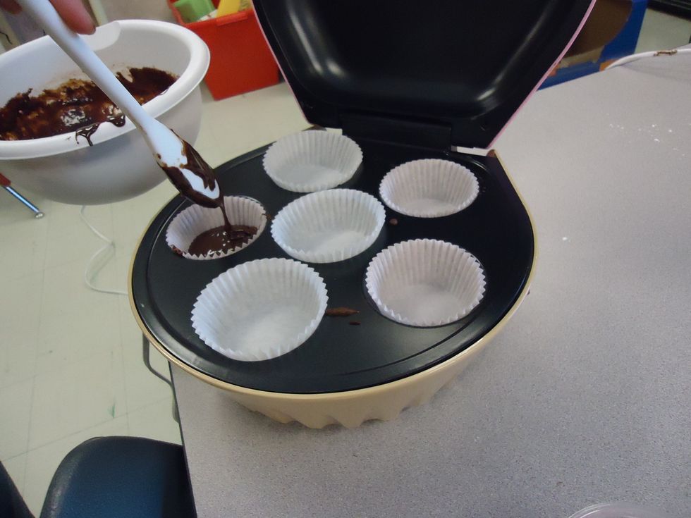 Put the mix of ingredients in the cupcake pan or liners. Put the cupcakes in the oven for 20 minutes.