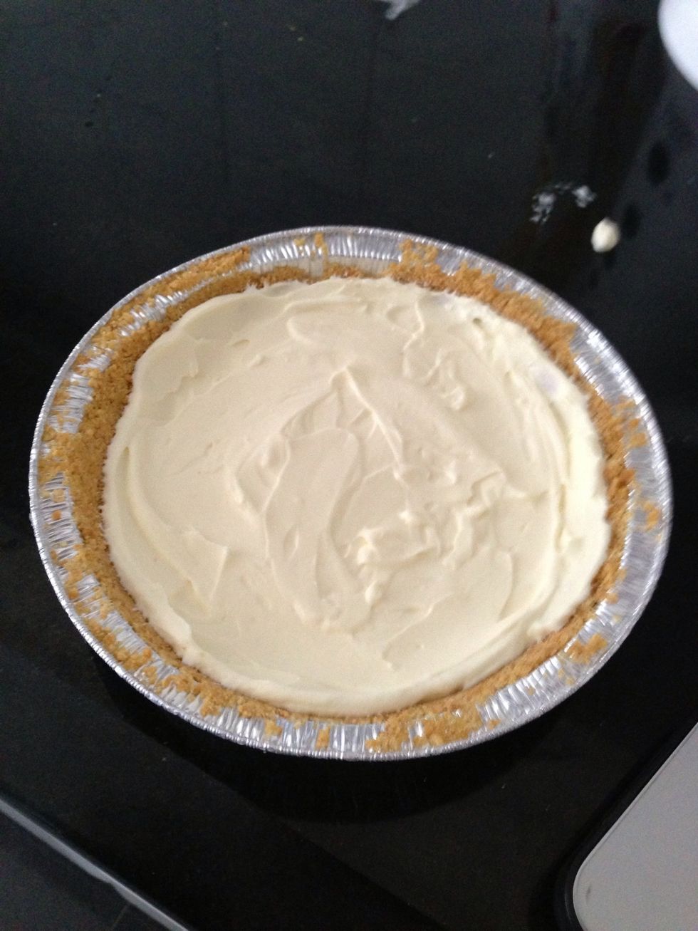 Put the mixed cream cheese in the pan with crumble