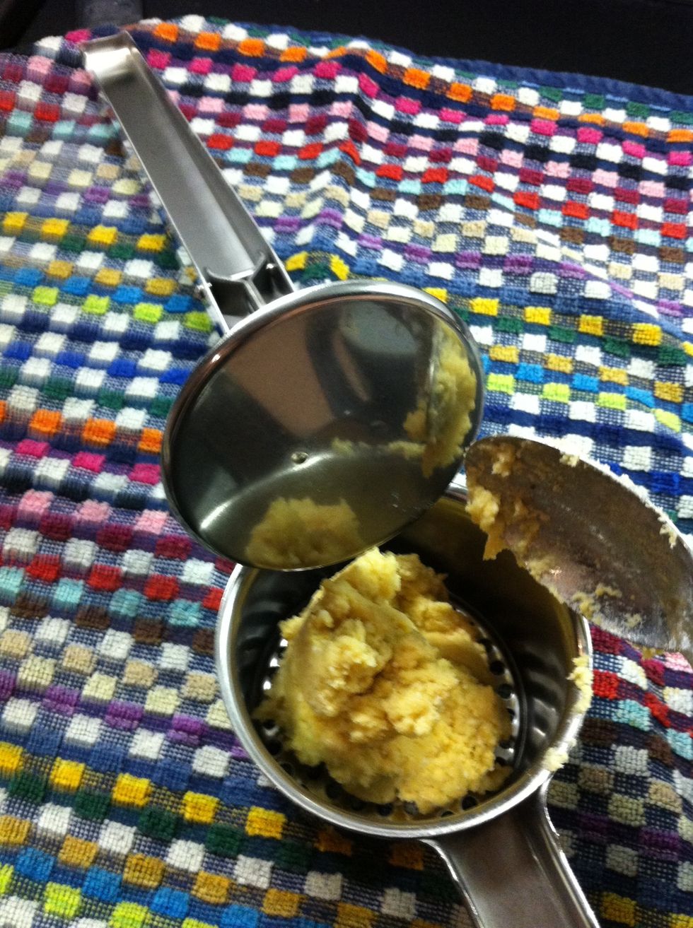 Put the mixture in the potato ricer