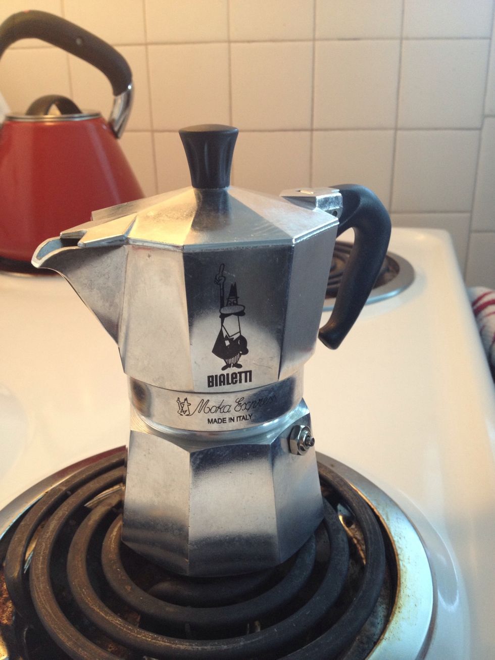 Put the moka on the stove at a low to medium heat.