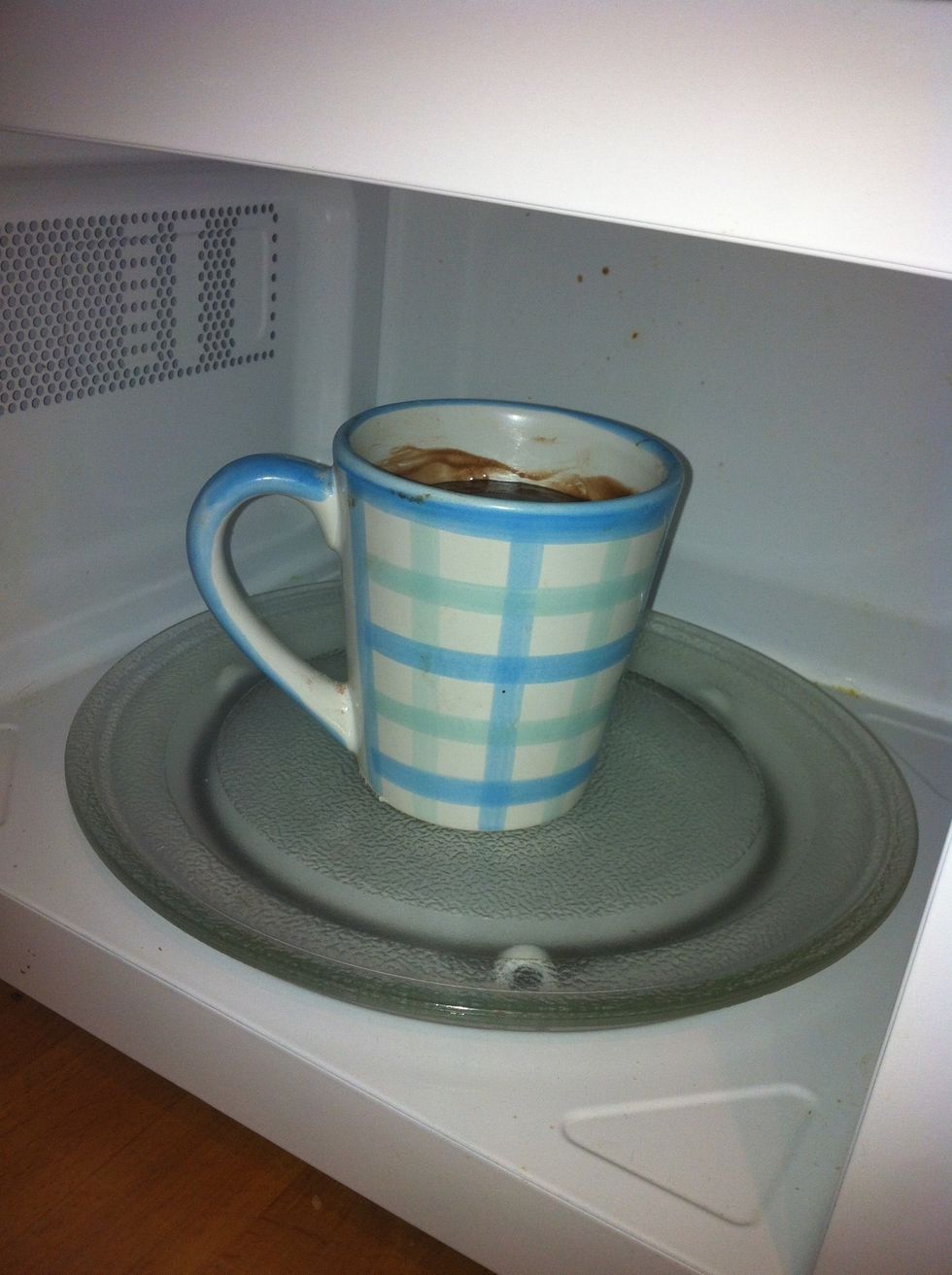 Put the mug into the oven.
