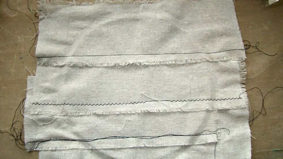 Put the muslin pieces inside the hoop and tighten then remove and it will leave you a crease around to know where you working area is going to be.