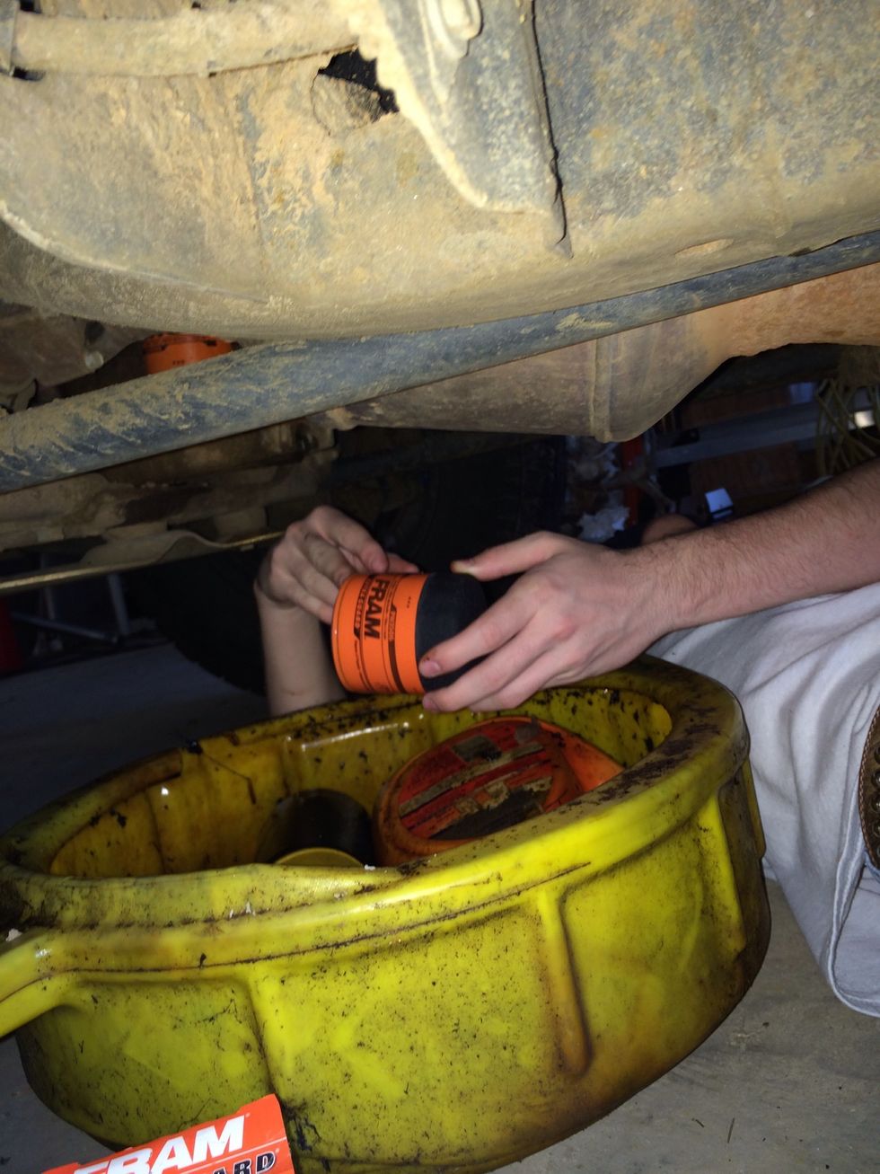 Put the new oil filter on