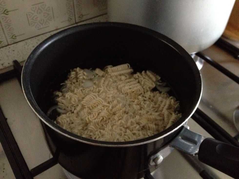 Put the noodles into boiling water
