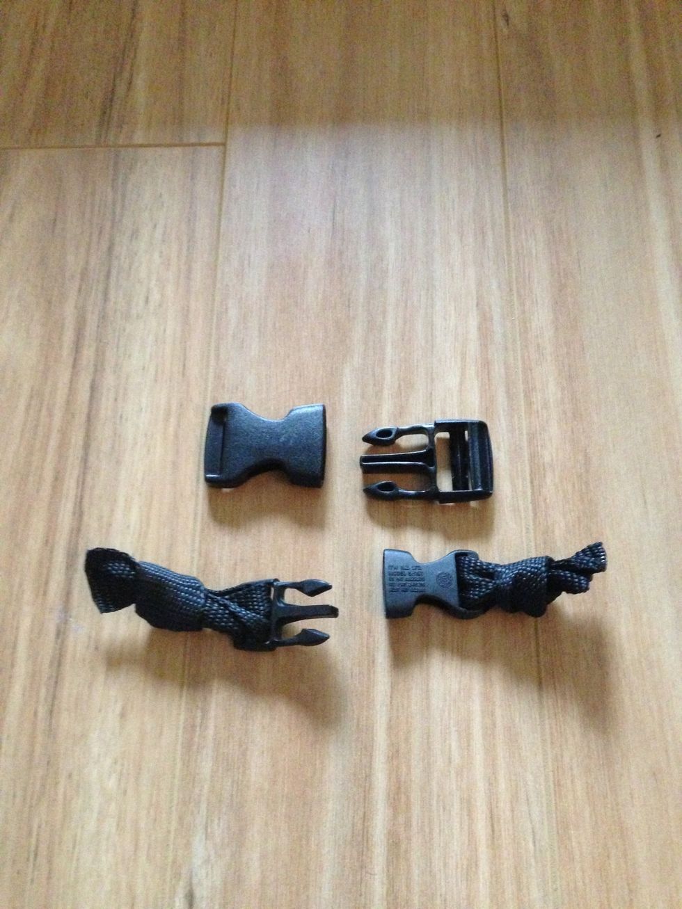 Put the nylon thru the plastic buckle and tie a not to hold it