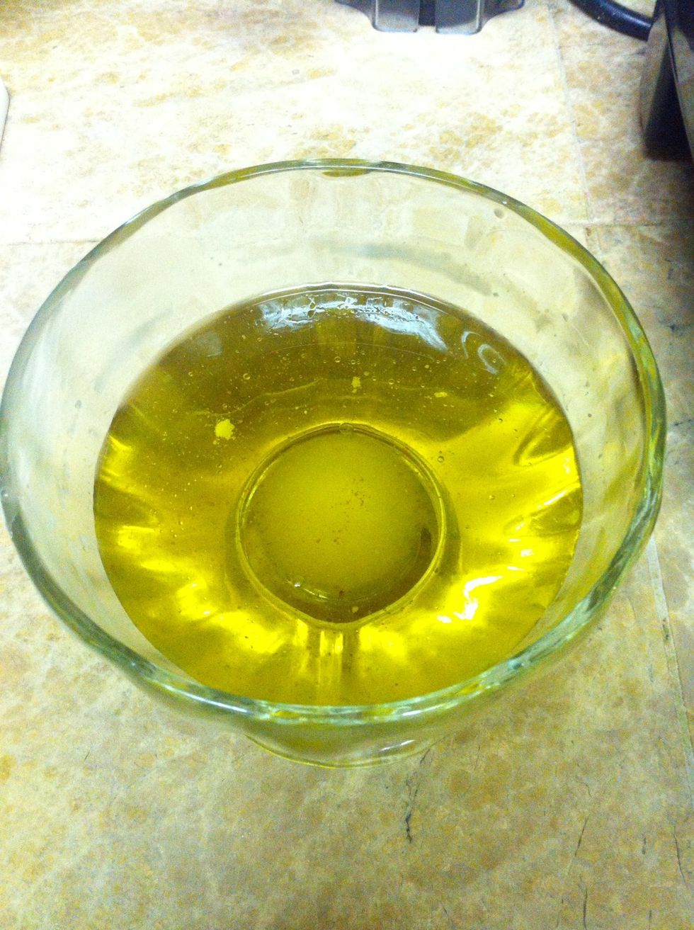 Put the olive oil in a bowl.