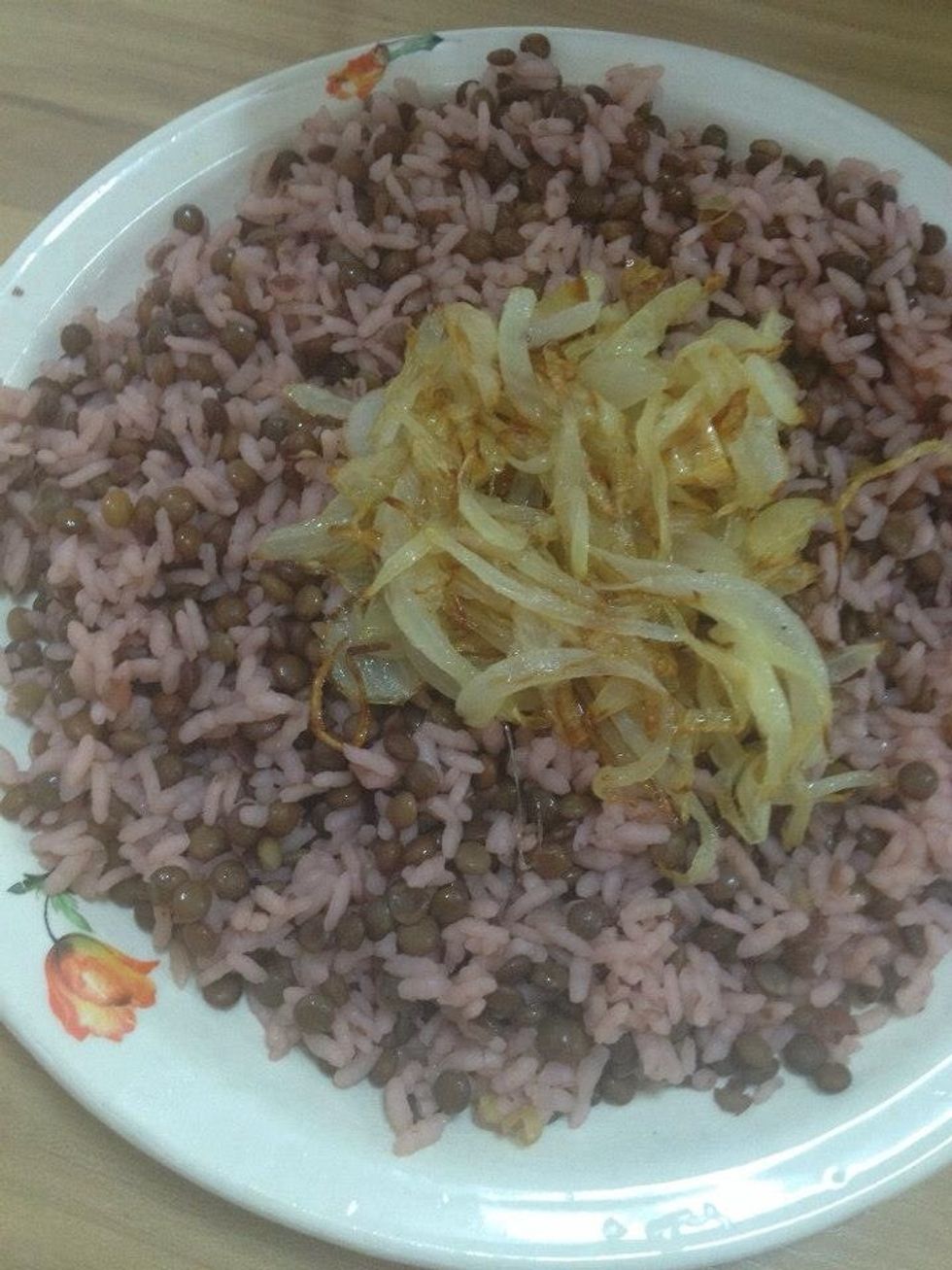 Put the onions and stir it with the rice
