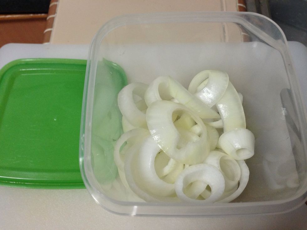 Put the onions inside a container or a zip lock bag