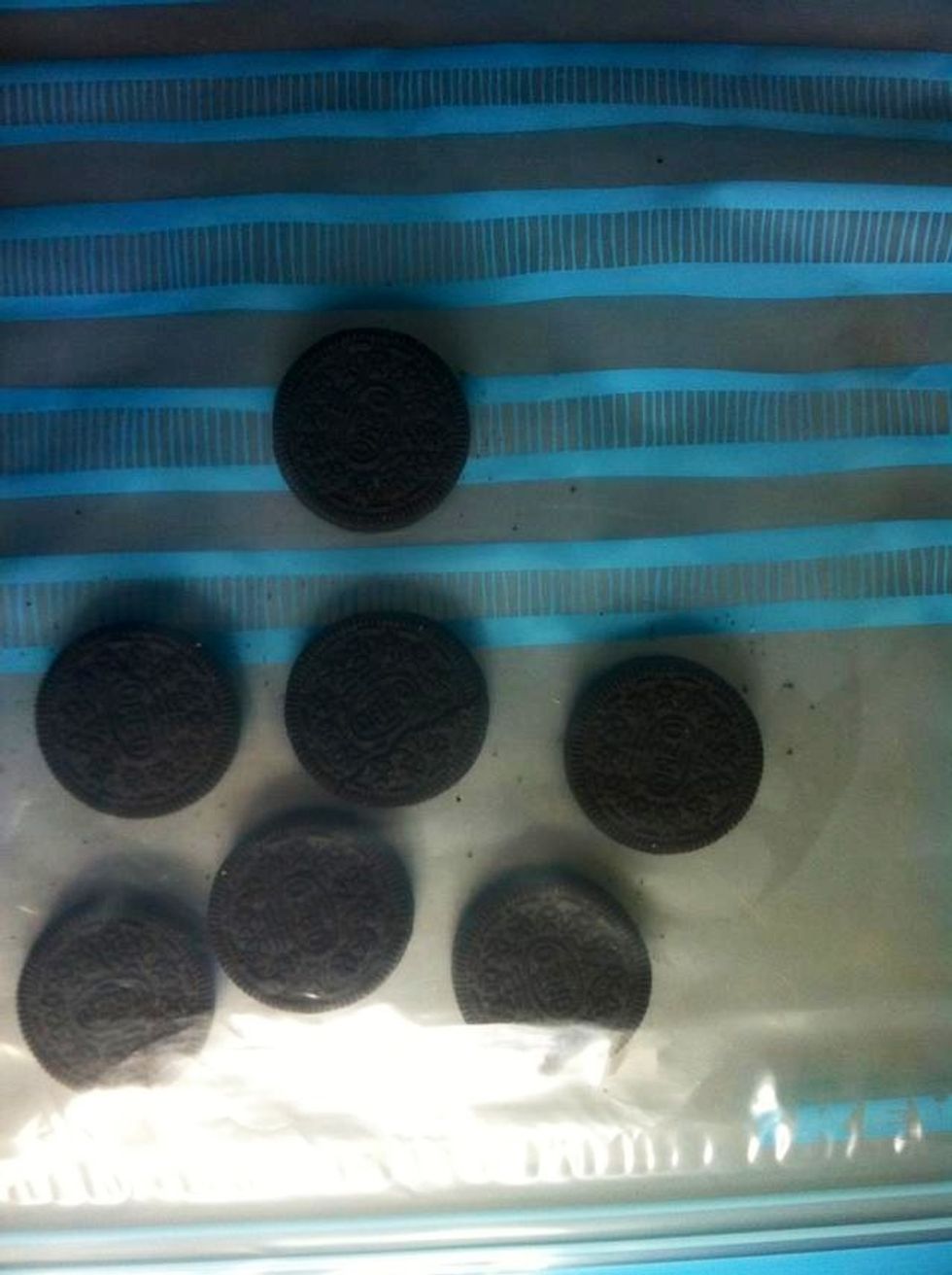Put the oreo's in a zip bag, and crush them with a rolling pin