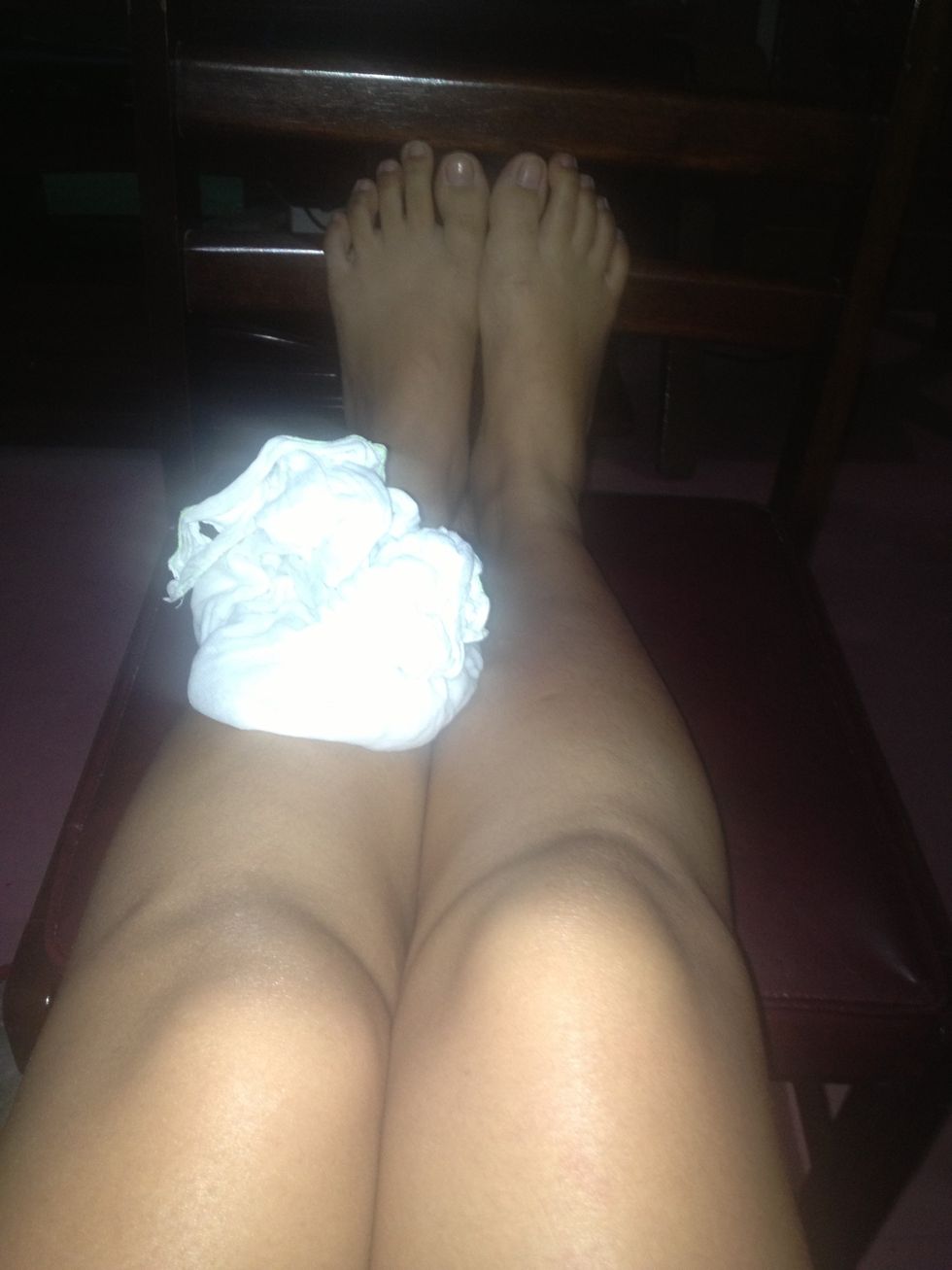 Put the pack of ice above your legs,