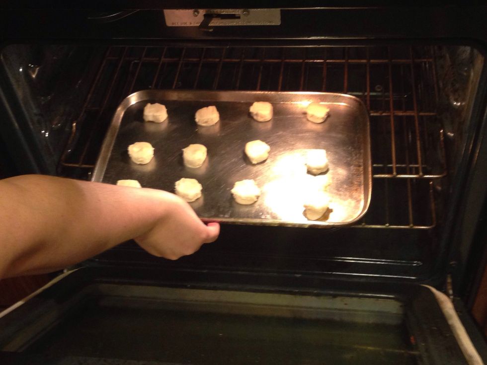 Put the pan in the oven and set the time to 14 mins.