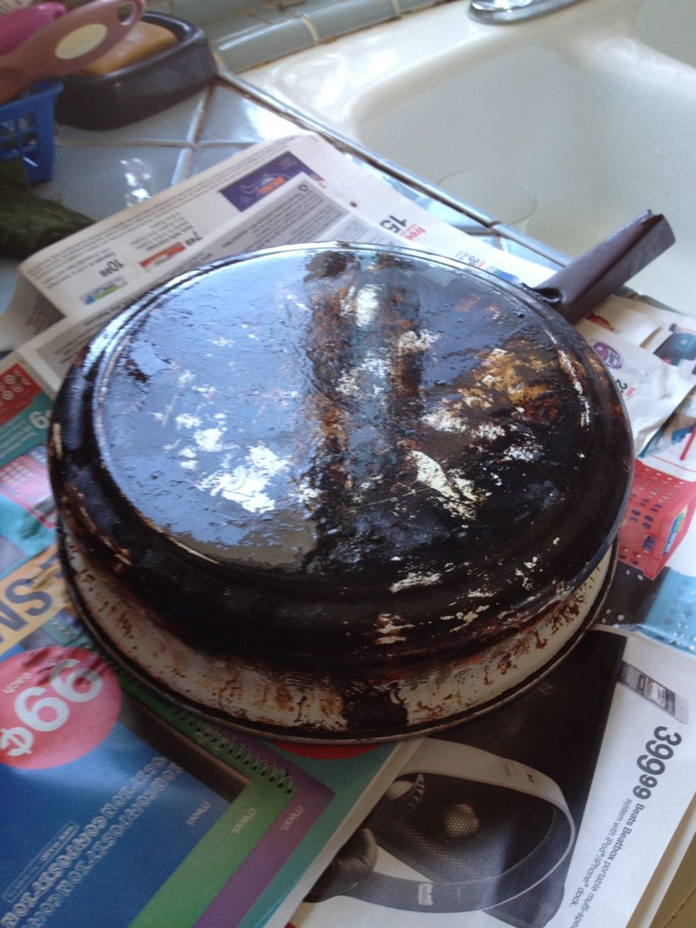 Put the pan on some newspaper in a well ventilated area. That means open up the windows! This stuff is poison! My apologies to the planet. \ud83d\ude25