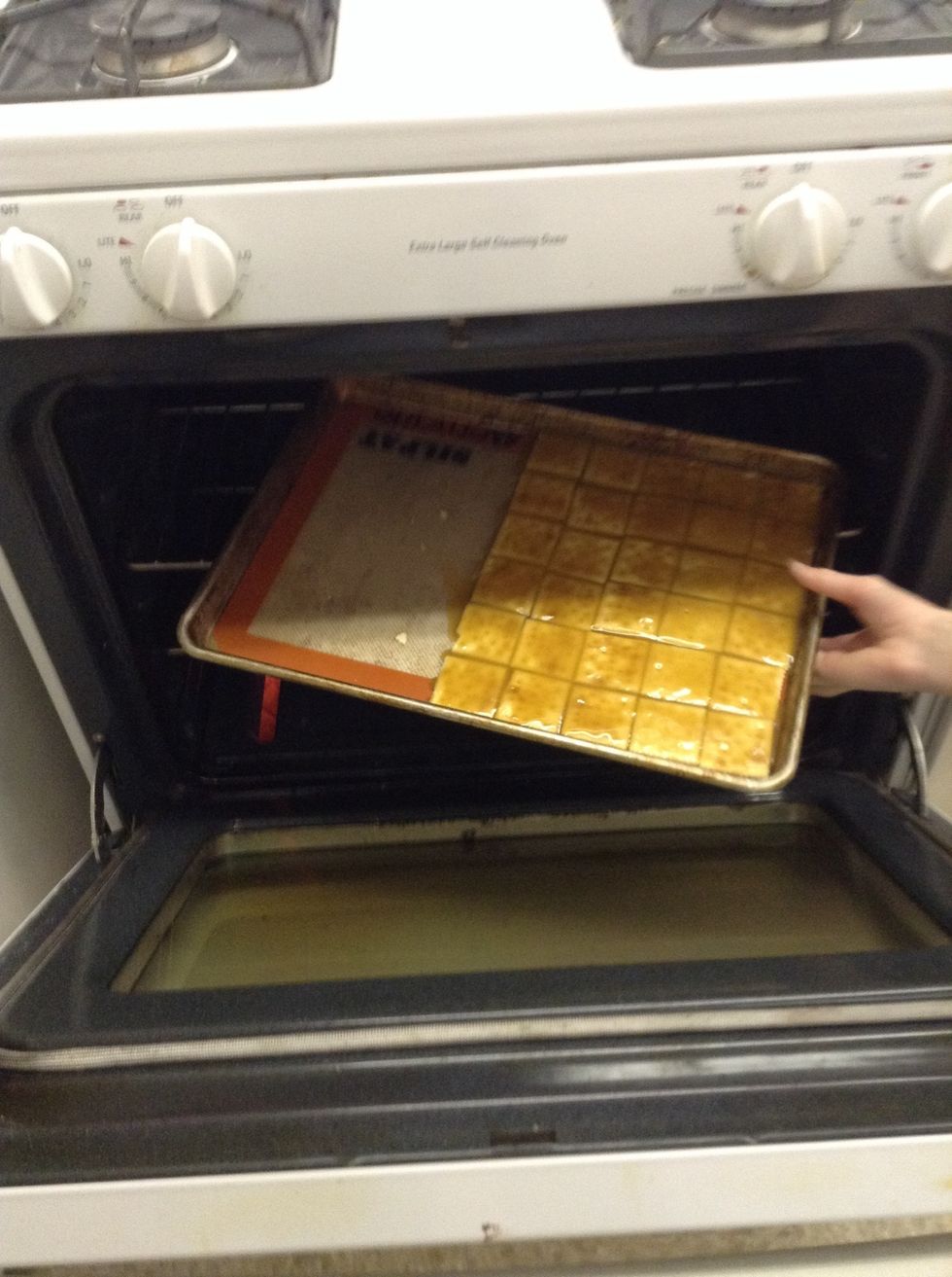 Put the pan with the crackers and caramel in the 350 degree oven for 7 minutes.