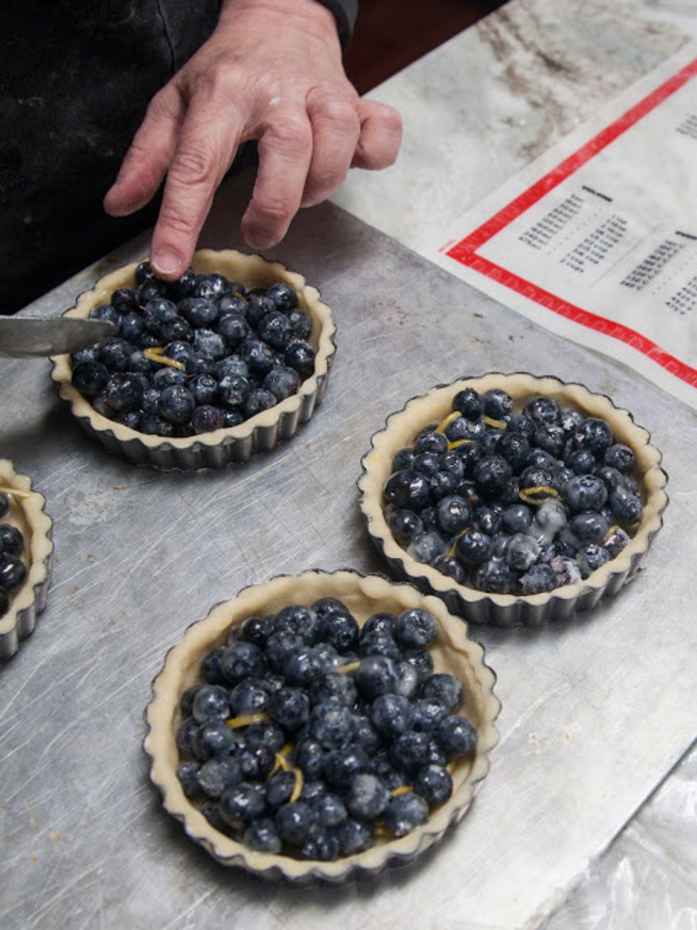 Put the pans on a baking sheet and pop them into the 375 degree oven.
