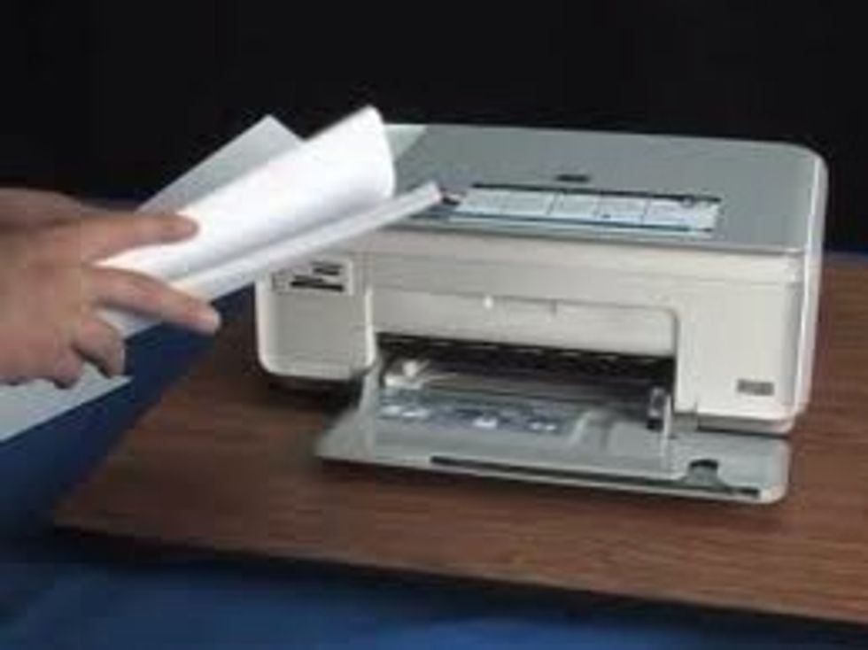 put the paper in the paper pocket