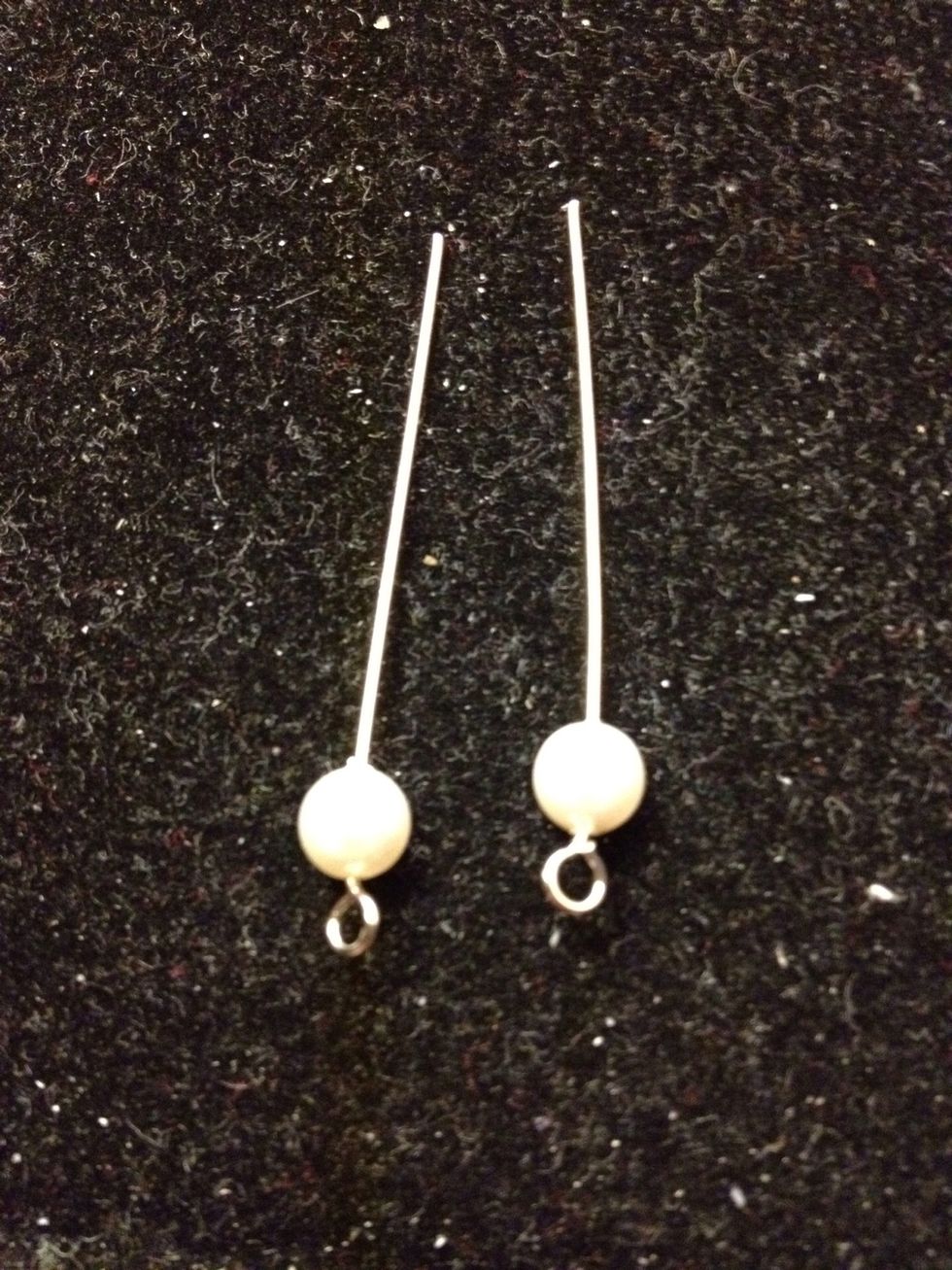 Put the pearl through the eyepin.