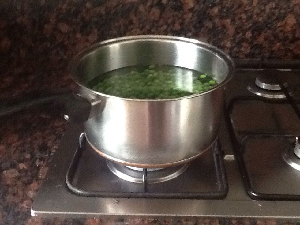 Put the peas in a pot of boiling water then cook until soft  1km of frozen peas - 640 calories 54g protein 8 fat  7.6g carbohydrates