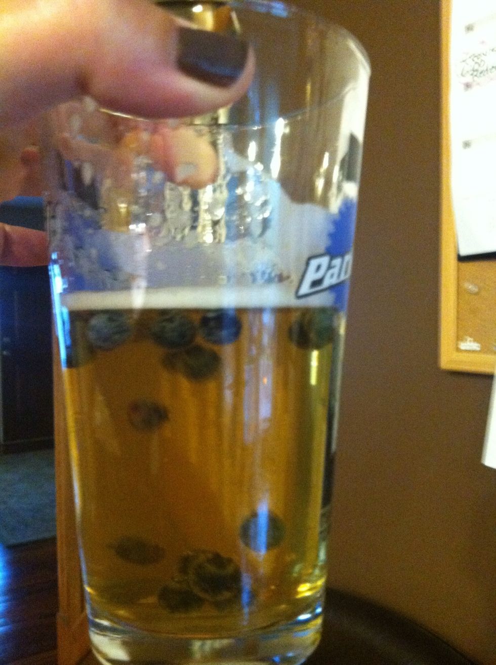 Put the pie in the oven... 425 for 15 minutes then... 350 for 35-40 minutes (watch the color of the crust) While the pie is baking enjoy a beverage. I suggest, a nice wheat beer with a few berries.