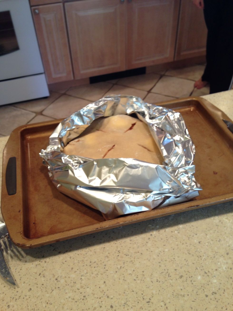 Put the pie on a cookie sheet and wrap the edges in aluminum foil.  This prevents the edges from burning.