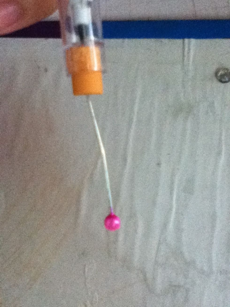 Put the pin in back eraser of pencil