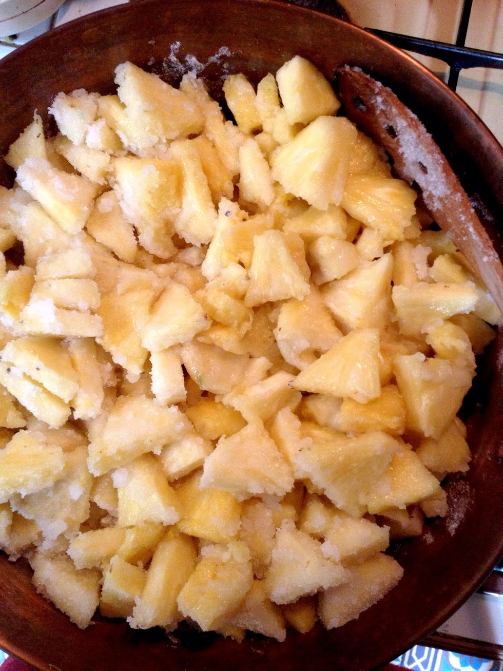 Put the pineapple and sugar in a large saucepan and let stand for 3 hours, stirring regularly.