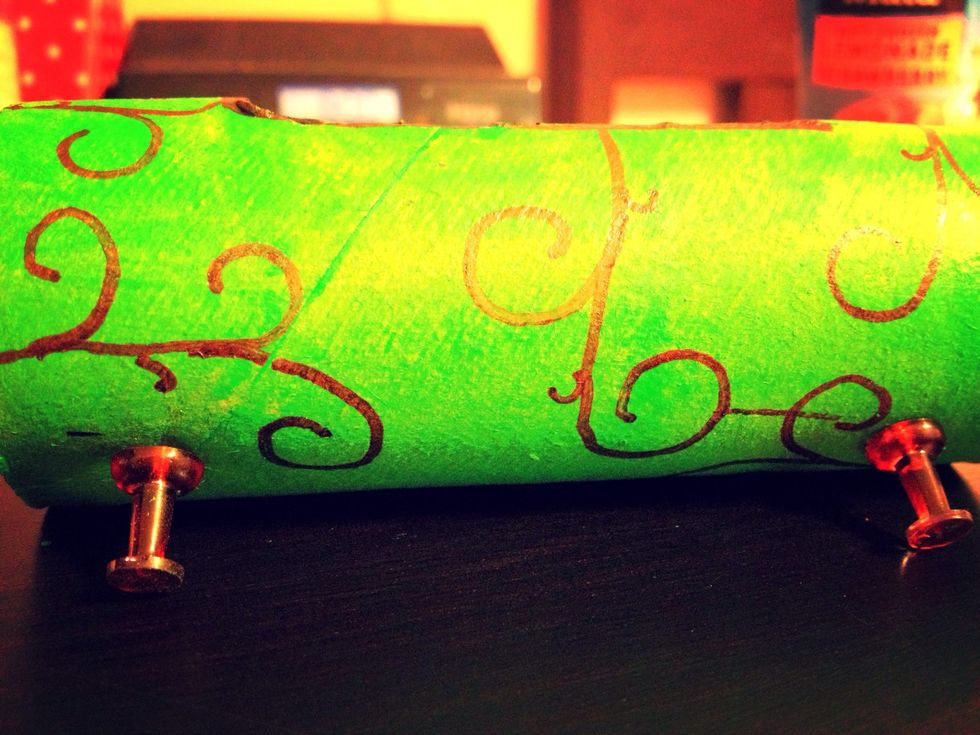 Put the pins into the t.p. roll