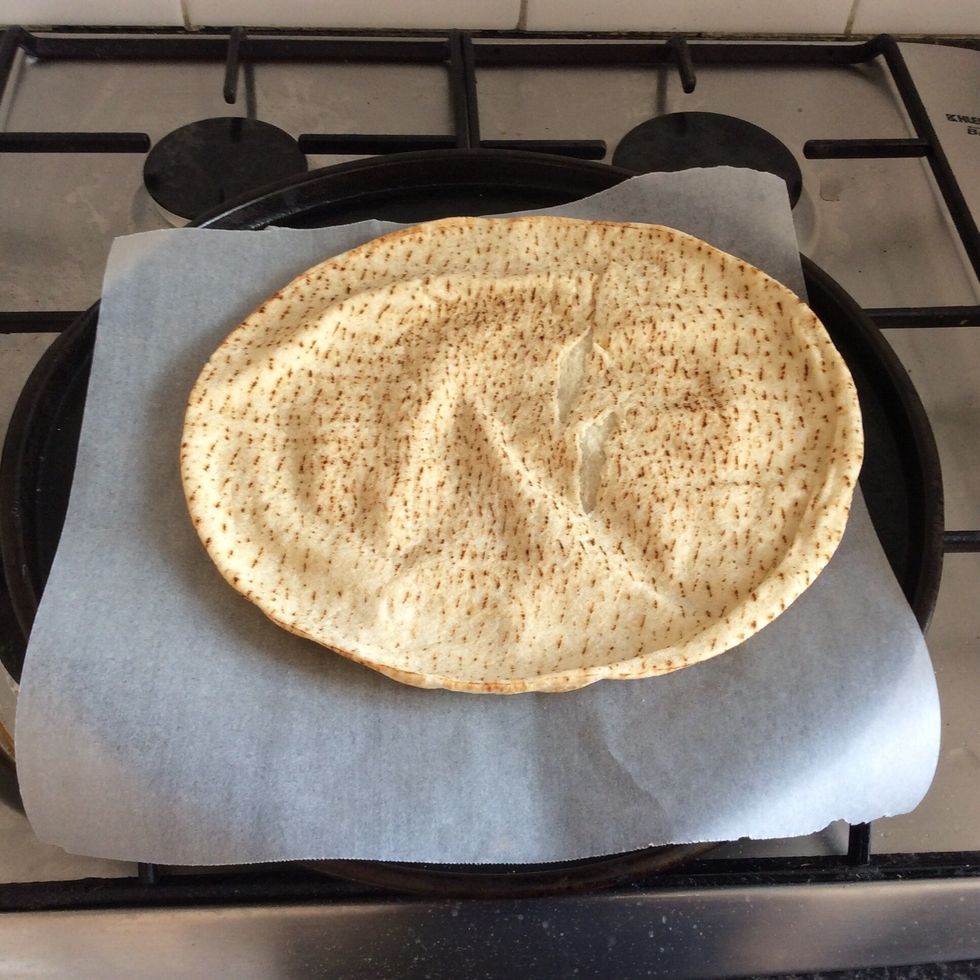 Put the pita bread onto the tray