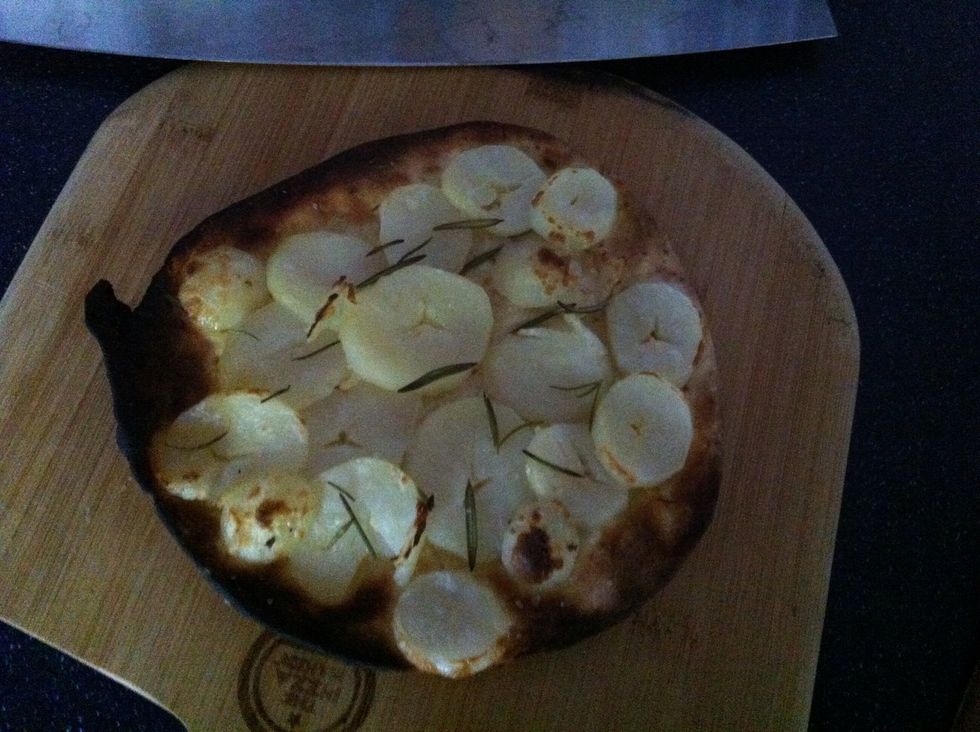 Put the pizza onto the cutting board