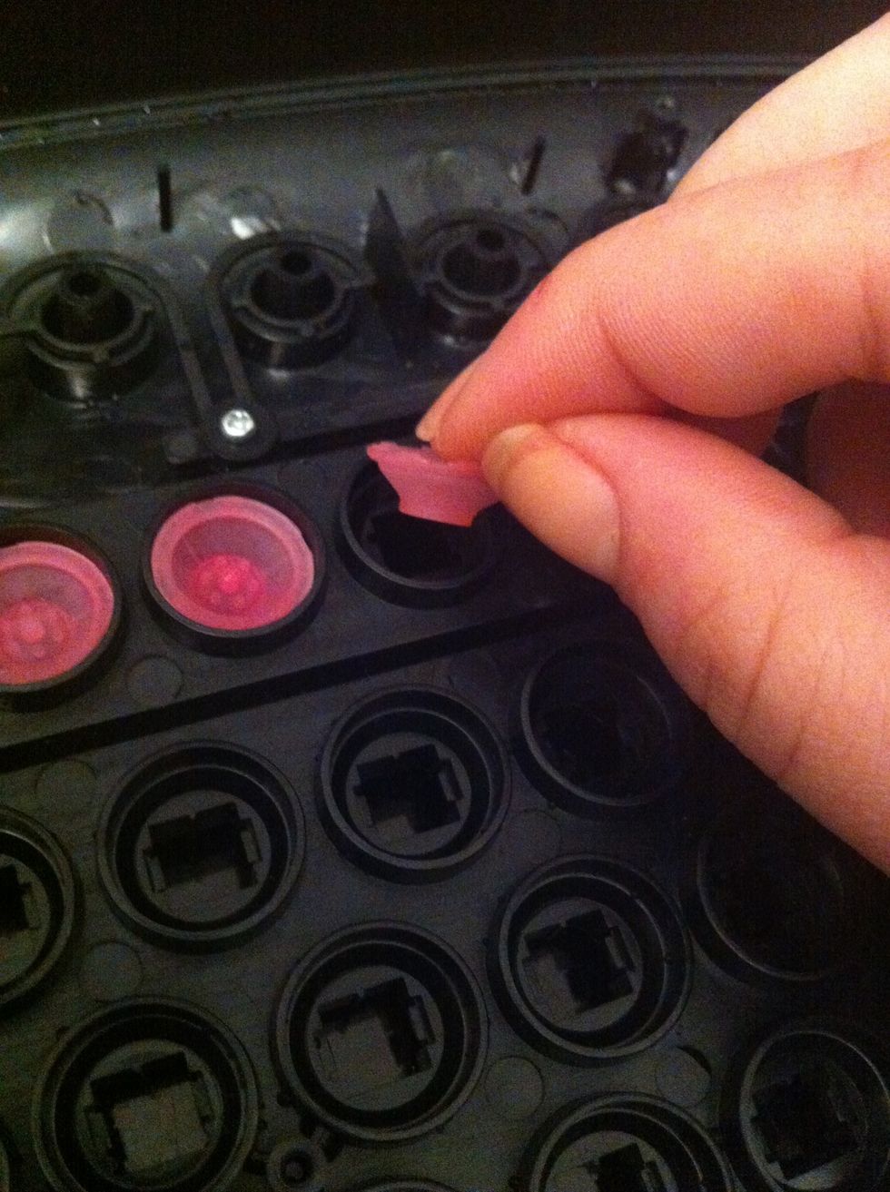 Put the plastic buttons