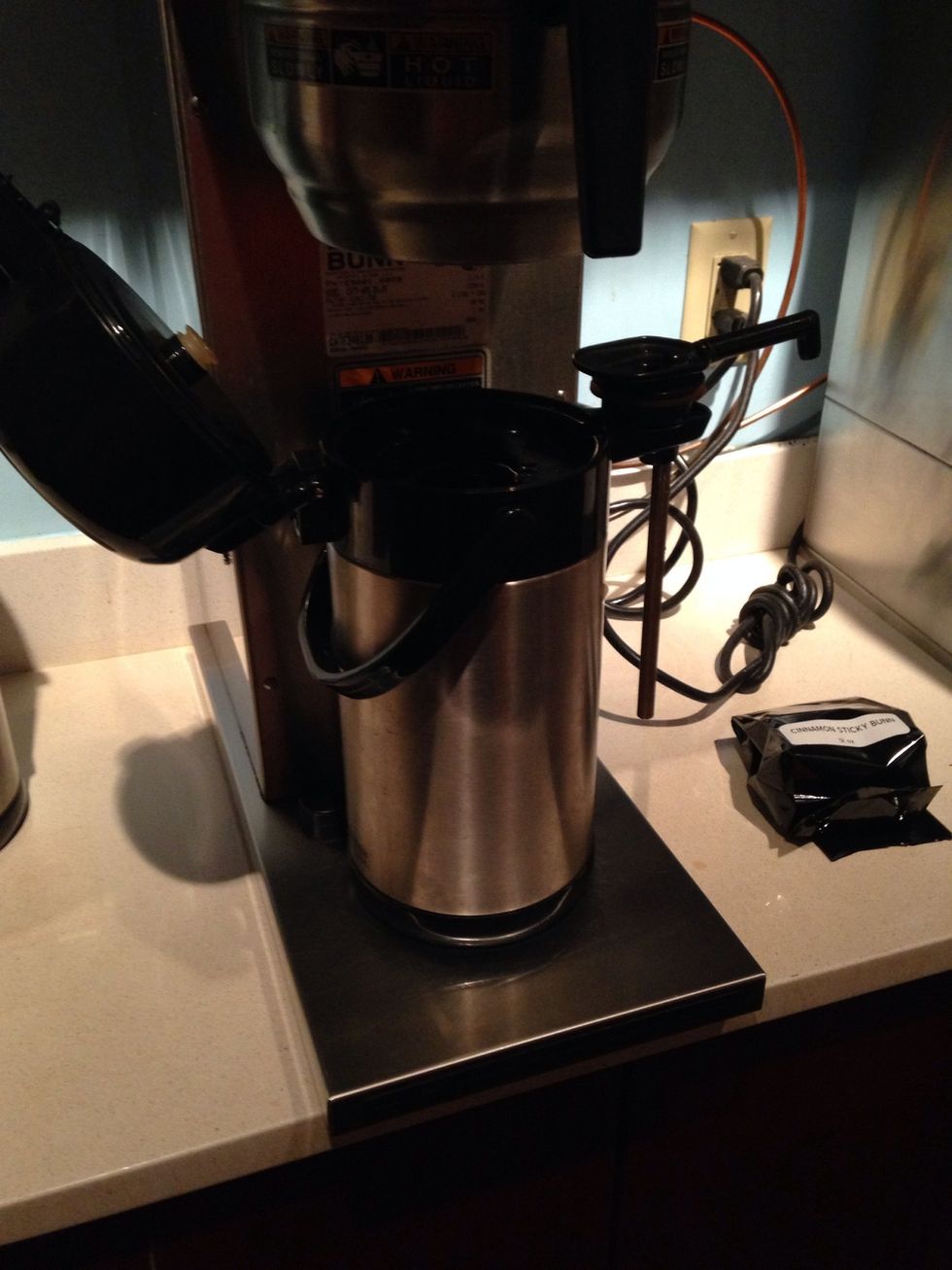 Put the pot under the dispenser.