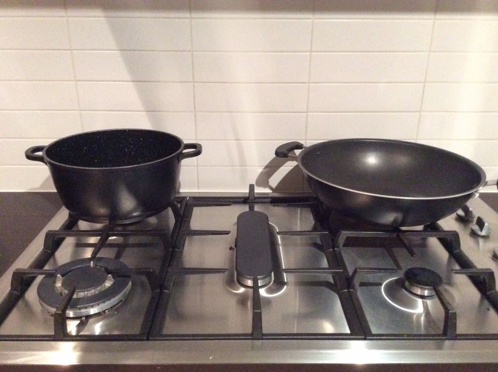 Put the pots on the stove.