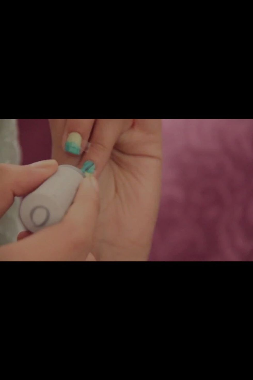 put the pueces of tape in your nail making a line, paint with other color and wait to dry.