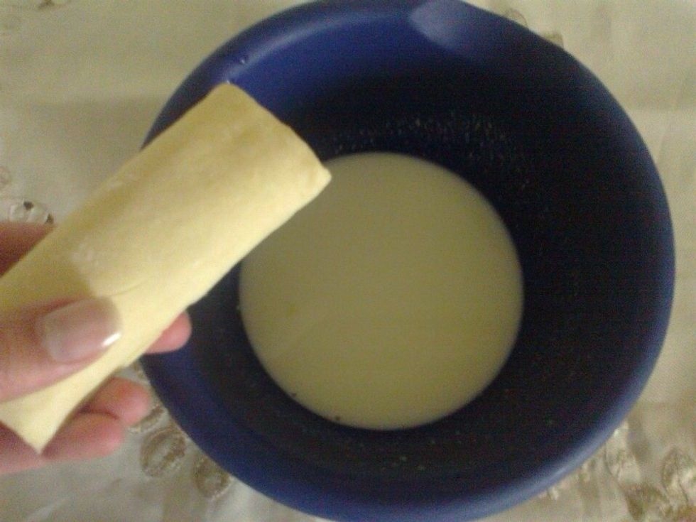 Put the puff pastry in a milk for a second