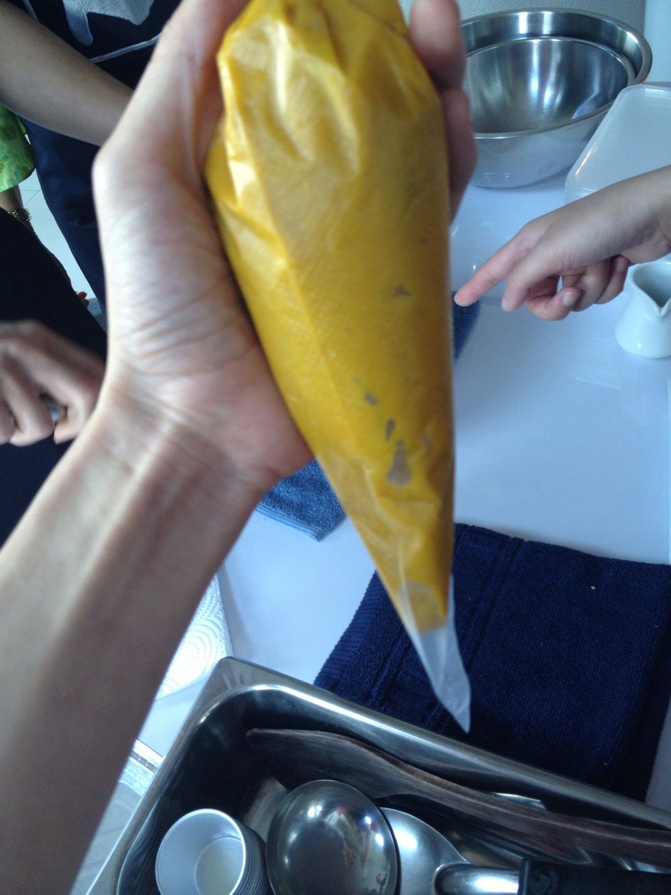 Put the pumpkin in a pipping bag.