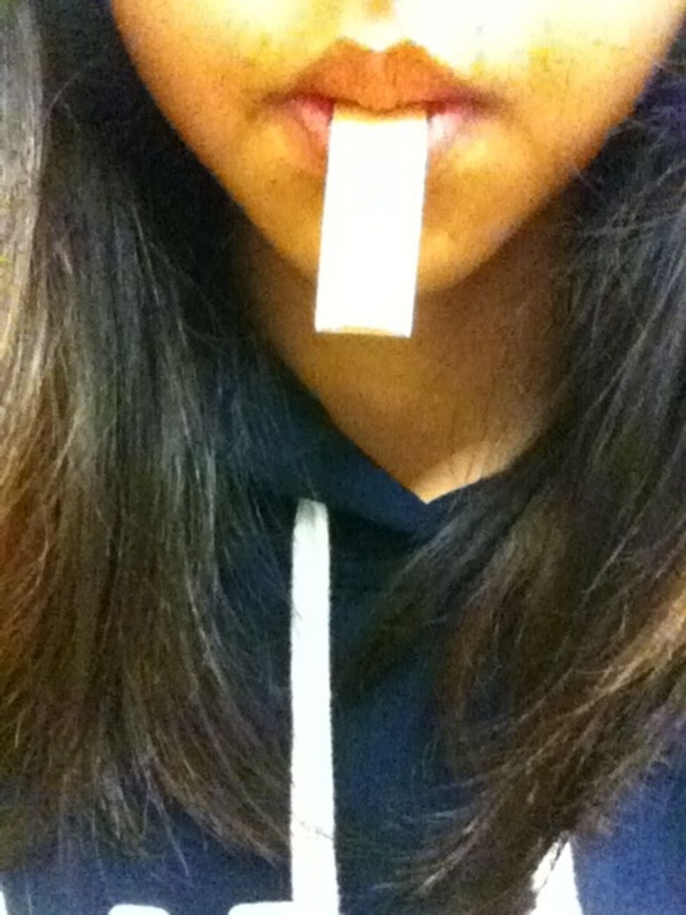 Put the reed in the your in your mouth to get the reed ready for playing .