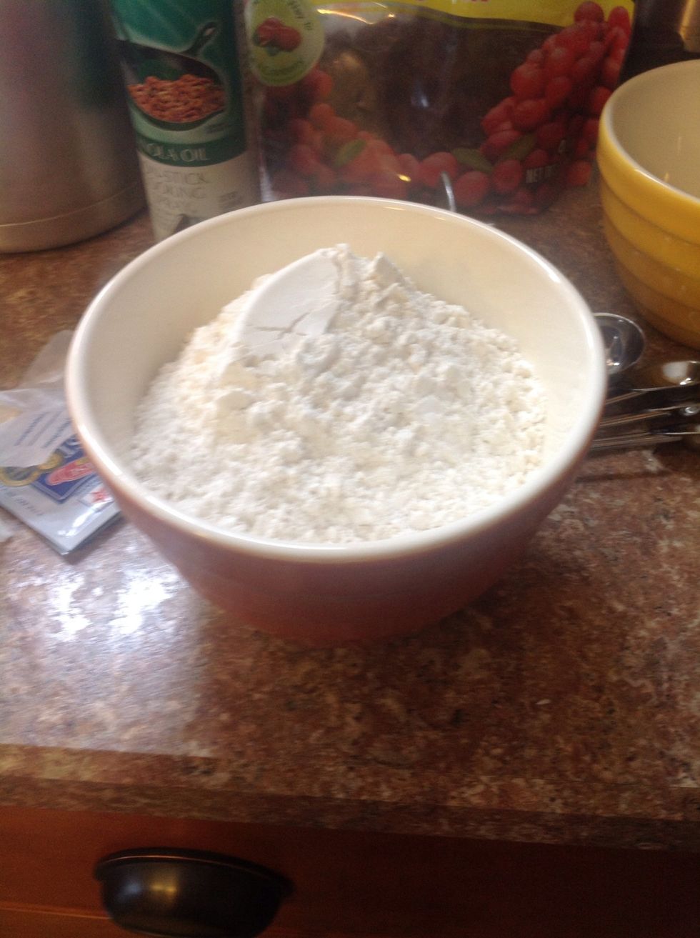 Put the remaining 3 cups of flour in a small bowl