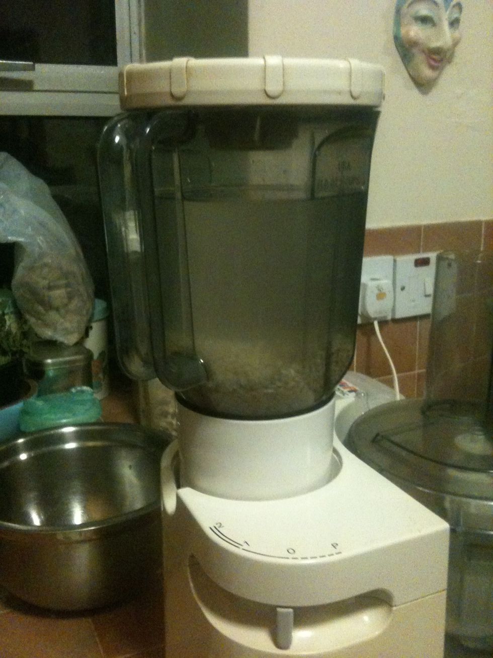 Put the rice and 3 cups of water (preferably filtered) into a blender. Whizz it up on the top setting for about 3 minutes, or until the rice grains have become very fine particles.