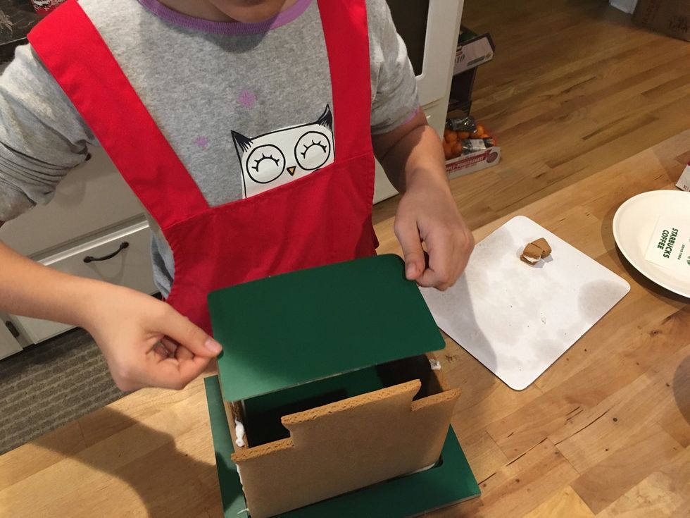 Put the roof on with some frosting.