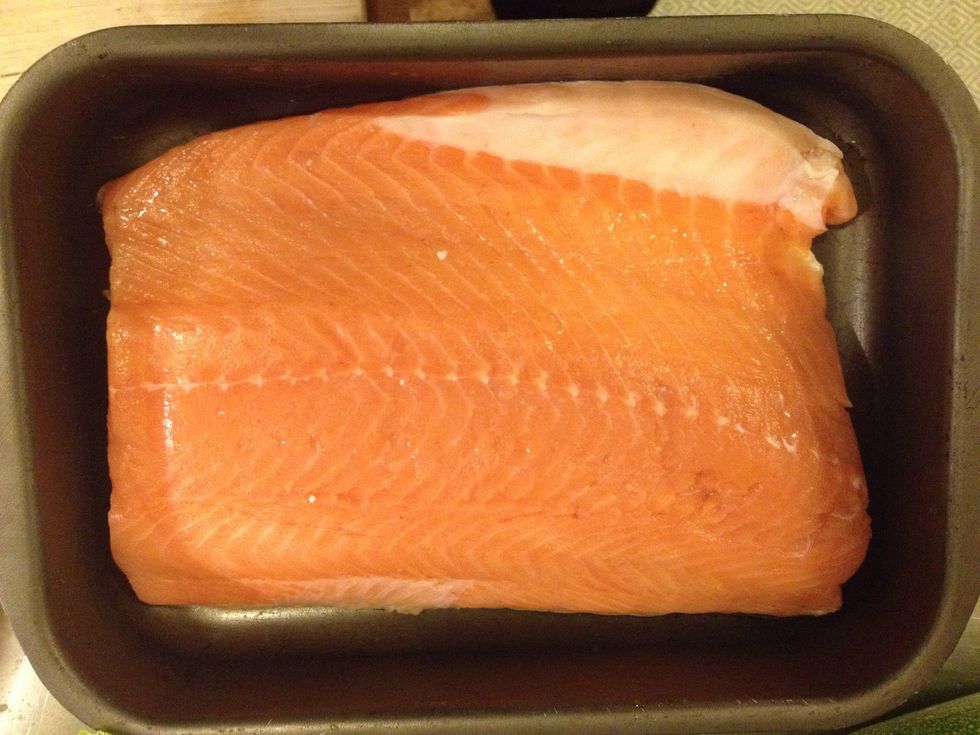 Put the salmon in a tin, put a pinch of salt on it.