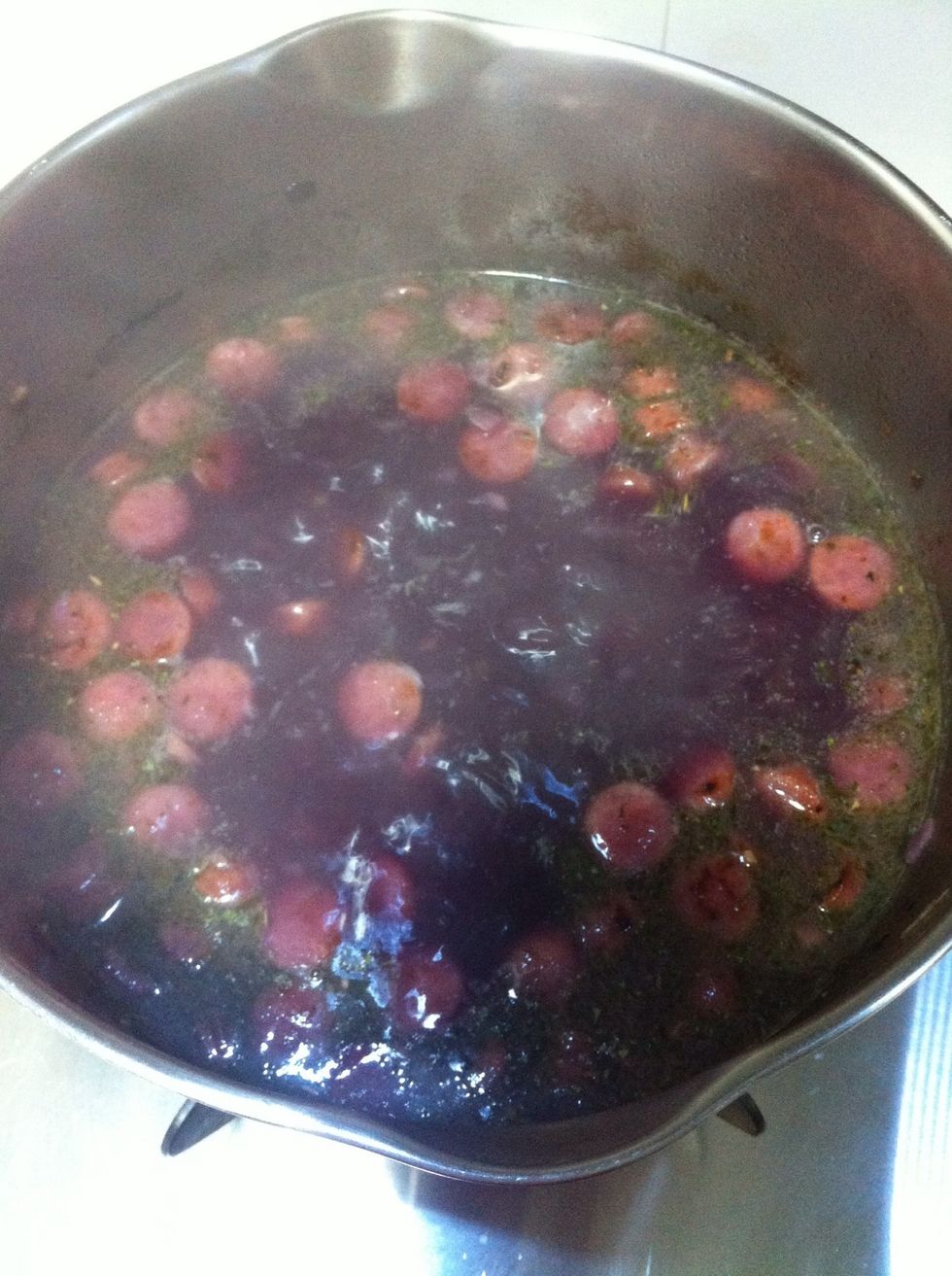 Put the sausages into the soup, add herbs u like (parsley, basil, etc.) and cook it for 5 min.