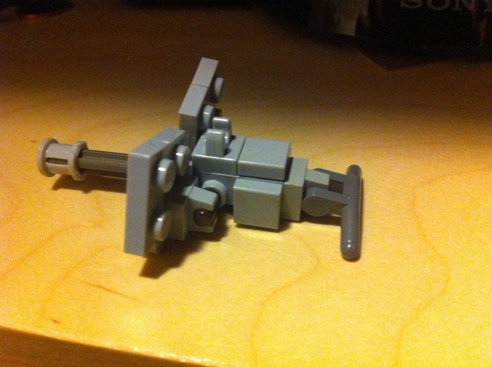 Put the singles around the edge and the clips on top and on the rod and the put the flat on the clips on the side.