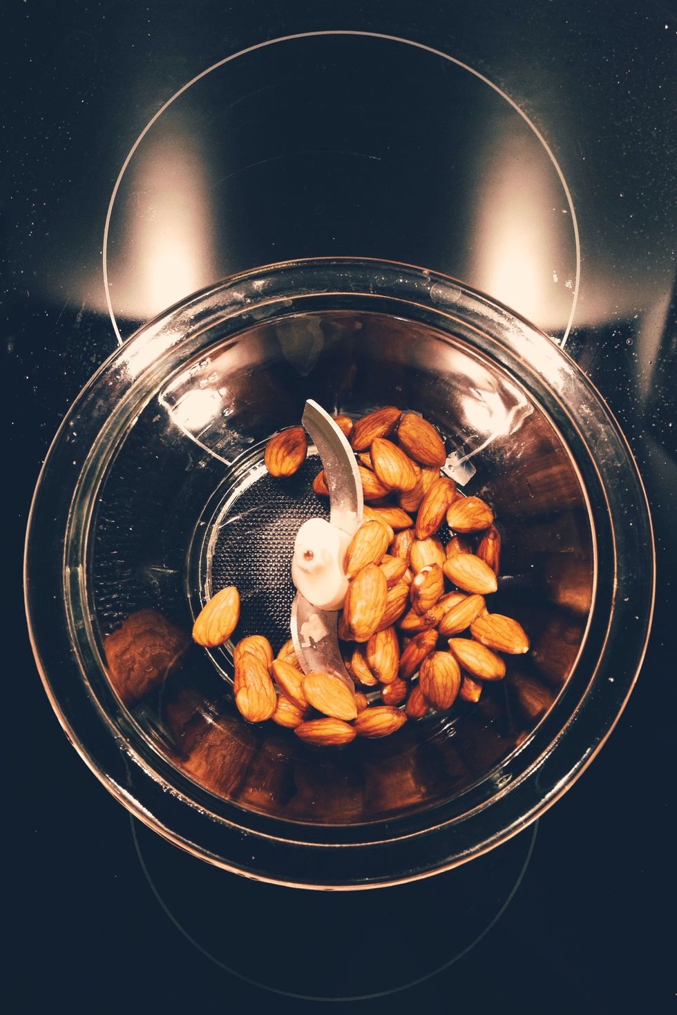 Put the soaked almonds in a blender/food procesor and process for a minute.
