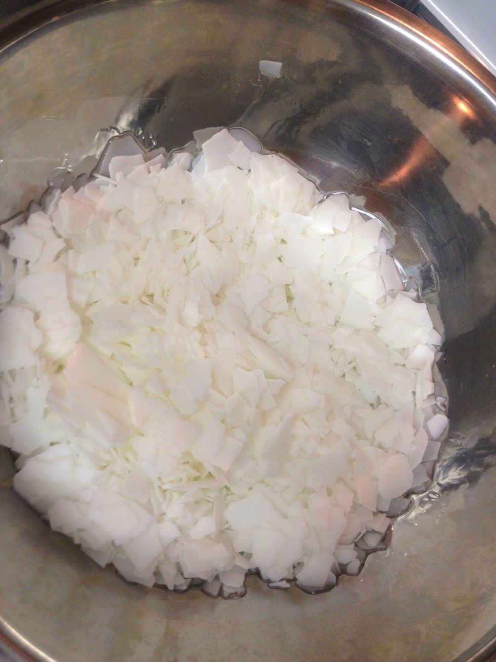 Put the soy flakes into the bowl - they will start to melt quickly, so stir occasionally. If they heat too quickly and at too high of a temperature, they will be over cooked and won't harden.