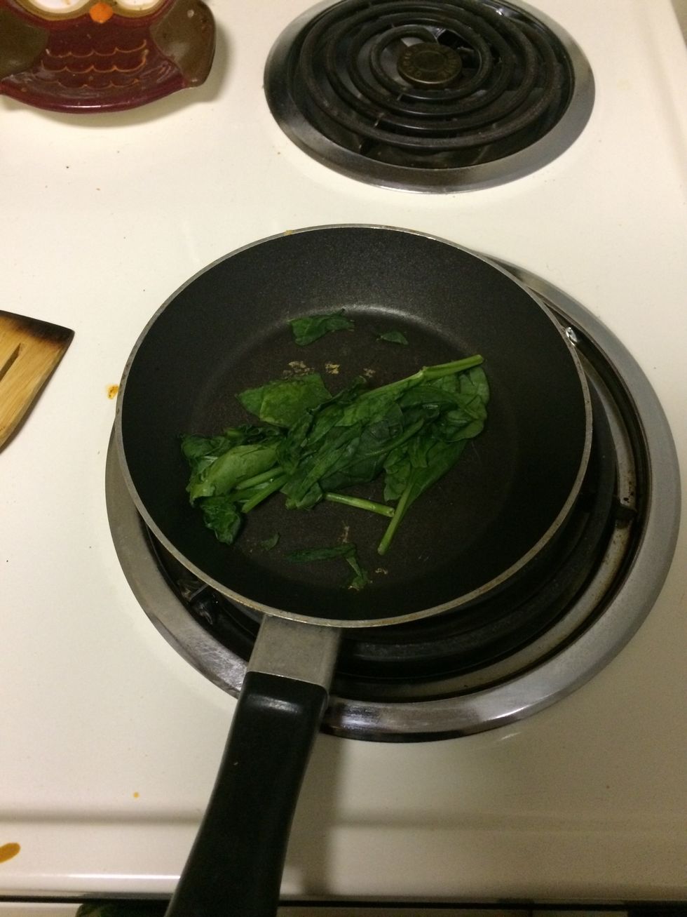 Put the spinach in the skillet and just let the spinach wilt. Once it gets to a dark green and the leaves are smaller take off the heat. I had it on medium low heat for about 5-10 minutes.