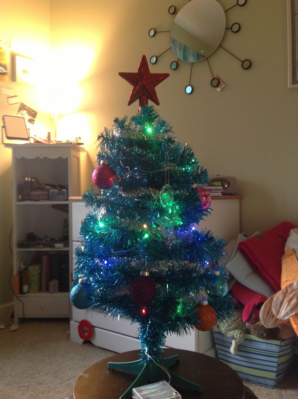 Put the star t the top of the tree.