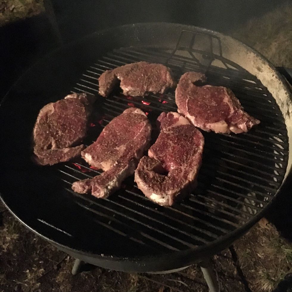 Put the steaks on the grill, make sure you keep space between the steaks