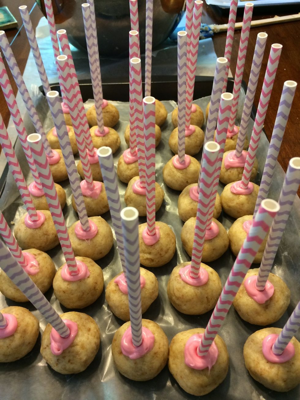 Put the sticks into the balls and allow 30-40 minutes in the refrigerator to set
