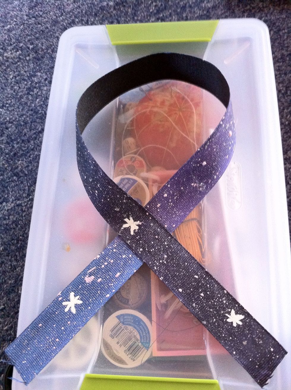 Put the string into the breast cancer sign and glue where they meet