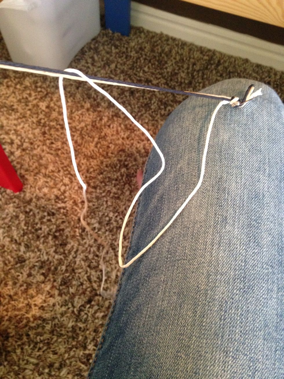 Put the string that you want to see first, over the other strings, but leave a whole.