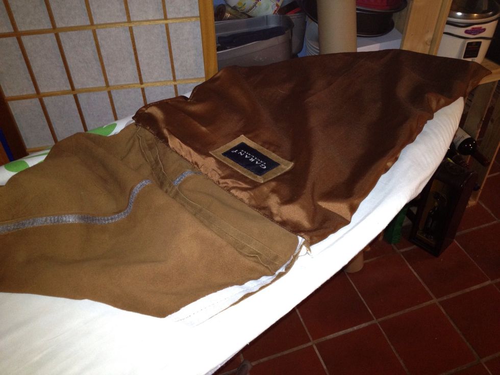 Put the suede bag, outside in, inside the lining with the out side out.